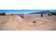 Generous vacant land, enclosed by a concrete fence, ideal for a private retreat at 10910 N Thunderbird Rd, Maricopa, AZ 85139