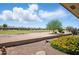The backyard is landscaped with low-maintenance desert landscaping at 11059 E Kilarea Ave, Mesa, AZ 85209