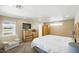 Bright main bedroom features a ceiling fan, natural light and neutral color palette at 11059 E Kilarea Ave, Mesa, AZ 85209