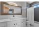 Bathroom features a long vanity and a shower/tub combo with a shower curtain at 11123 E Monument Dr, Scottsdale, AZ 85262