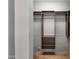 Closet features built-in shelving, drawers, and hanging racks at 11123 E Monument Dr, Scottsdale, AZ 85262