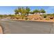 Troon North Golf Club entrance featuring lush desert landscaping and boulder signage at 11123 E Monument Dr, Scottsdale, AZ 85262