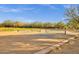 Community pickleball court with professionally maintained landscaping and mature trees at 11123 E Monument Dr, Scottsdale, AZ 85262