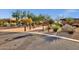 Community walking path near the amenities center with shade and desert landscaping at 11123 E Monument Dr, Scottsdale, AZ 85262