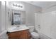 Bathroom with shower-tub combination and a light wood vanity at 12443 W Via Camille --, El Mirage, AZ 85335