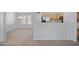 The dining area is partially open to the kitchen with ample lighting at 12443 W Via Camille --, El Mirage, AZ 85335