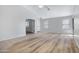 Spacious living room with neutral walls and a ceiling fan at 12443 W Via Camille --, El Mirage, AZ 85335