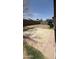 Spacious backyard featuring a patio, block wall and ample space for customization at 12505 W Adams St, Avondale, AZ 85323