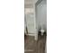 Bathroom showcasing a toilet and stand up shower with framed glass door at 12505 W Adams St, Avondale, AZ 85323