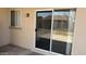 Image features sliding glass doors leading to patio area at 12505 W Adams St, Avondale, AZ 85323