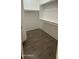 Walk-in closet with shelving and rod for storage in the home at 12505 W Adams St, Avondale, AZ 85323