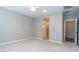 Spacious bedroom includes ceiling fan and an en suite bathroom with a walk-in shower at 12547 W Stella Ln, Litchfield Park, AZ 85340