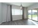 Bright dining room features a sliding glass door with views of the yard at 12547 W Stella Ln, Litchfield Park, AZ 85340