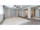 Open floorplan with neutral colors, wood-look flooring, and lots of natural light at 12547 W Stella Ln, Litchfield Park, AZ 85340