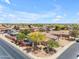 Neighborhood aerial shot showcasing roofs and mature trees at 12630 W Corrine Dr, El Mirage, AZ 85335