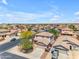 Aerial shot of a neighborhood showing desert landscaping and houses with roof at 12630 W Corrine Dr, El Mirage, AZ 85335