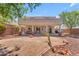 A covered patio overlooking the backyard at 12630 W Corrine Dr, El Mirage, AZ 85335