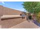 Backyard grill area with built in counter and brick pavers at 12630 W Corrine Dr, El Mirage, AZ 85335