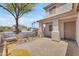 Inviting covered front porch with decorative columns and tile flooring, offering a welcoming entrance at 12630 W Corrine Dr, El Mirage, AZ 85335