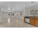 Bright kitchen area with sink and view to the outside at 12630 W Corrine Dr, El Mirage, AZ 85335
