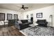 Inviting living room featuring neutral tones, hardwood floors, with a gray sofa set at 12820 N 83Rd Pl, Scottsdale, AZ 85260