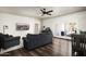 Open-concept living area featuring modern furniture and a view of the outdoor patio at 12820 N 83Rd Pl, Scottsdale, AZ 85260