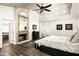 Tranquil main bedroom suite featuring a fireplace, vaulted ceilings, and access to the ensuite bath at 12820 N 83Rd Pl, Scottsdale, AZ 85260