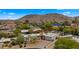A charming home with a private pool, mature landscaping, a driveway, and picturesque mountain views in a well-kept neighborhood at 13007 N 1St St, Phoenix, AZ 85022