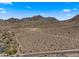 Vast desert landscape with trails showcasing natural beauty, mountains, and city views from an elevated perspective at 13007 N 1St St, Phoenix, AZ 85022