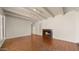 Open living room with terracotta tile and a warm fireplace for cozy evenings at 13007 N 1St St, Phoenix, AZ 85022