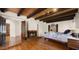 Comfortable bedroom with fireplace, arched doorways and wood and tile flooring at 13007 N 1St St, Phoenix, AZ 85022