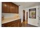 Charming pantry with ample cabinet space and views to the exterior at 13007 N 1St St, Phoenix, AZ 85022
