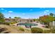 A private pool area with beautiful landscaping and mature trees, perfect for outdoor entertaining at 13007 N 1St St, Phoenix, AZ 85022