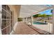 Covered patio providing shade, perfect for relaxation by the clear blue pool at 13007 N 1St St, Phoenix, AZ 85022
