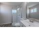 Bright bathroom featuring a glass enclosed shower and ample lighting at 1325 W 7Th Ave, Mesa, AZ 85202