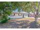 Charming single story home with low maintenance front yard and mature tree at 1325 W 7Th Ave, Mesa, AZ 85202