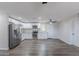 Bright kitchen features white cabinets, stainless steel appliances and an eat in space at 1325 W 7Th Ave, Mesa, AZ 85202