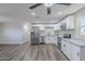New kitchen featuring stainless steel appliances, granite countertops, and modern cabinets at 1325 W 7Th Ave, Mesa, AZ 85202