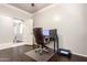 Spacious home office with a large desk setup and great lighting at 13561 W Montebello Ave, Litchfield Park, AZ 85340