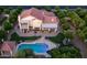 Overhead view of a house with a backyard featuring a pool, gazebo, and a meticulously landscaped yard with mature trees at 1532 N Ogden --, Mesa, AZ 85205