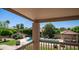 A backyard featuring a pool and spa, framed by lush landscaping and covered patios at 1532 N Ogden --, Mesa, AZ 85205