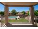 Balcony view overlooking a sparkling pool and lush backyard, offering a serene outdoor escape at 1532 N Ogden --, Mesa, AZ 85205