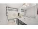 Well-lit bathroom with a single sink vanity, decorative shower curtain, and ample counter space at 1532 N Ogden --, Mesa, AZ 85205