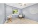 Functional home office featuring tile floors, large window, and a desk, perfect for remote work at 1532 N Ogden --, Mesa, AZ 85205