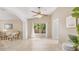 Bright living area with tile floors, a large window with an outdoor view and neutral walls at 1532 N Ogden --, Mesa, AZ 85205