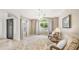Cozy living room featuring natural light, neutral tones, and comfortable seating, perfect for relaxing and entertaining guests at 1532 N Ogden --, Mesa, AZ 85205
