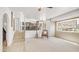 Open-concept living area with multiple living spaces, tile floors, and lots of natural light at 1532 N Ogden --, Mesa, AZ 85205