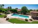 Inviting backyard pool and spa surrounded by lush landscaping and greenery creating a private oasis at 1532 N Ogden --, Mesa, AZ 85205