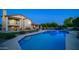 Lush backyard showcases a sparkling pool, manicured lawn, and a charming patio area, ideal for relaxation and entertaining guests at 1532 N Ogden --, Mesa, AZ 85205