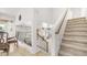 Bright staircase with carpeted steps leading to the second floor, offering a seamless transition between levels at 1532 N Ogden --, Mesa, AZ 85205